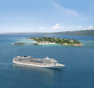 Caribbean and Antilles; MSC Divina; Island; Aerial view; Sea; Coastline; Sky; Starboard; Ship;