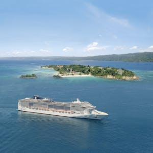 Caribbean and Antilles; MSC Divina; Island; Aerial view; Sea; Coastline; Sky; Starboard; Ship;